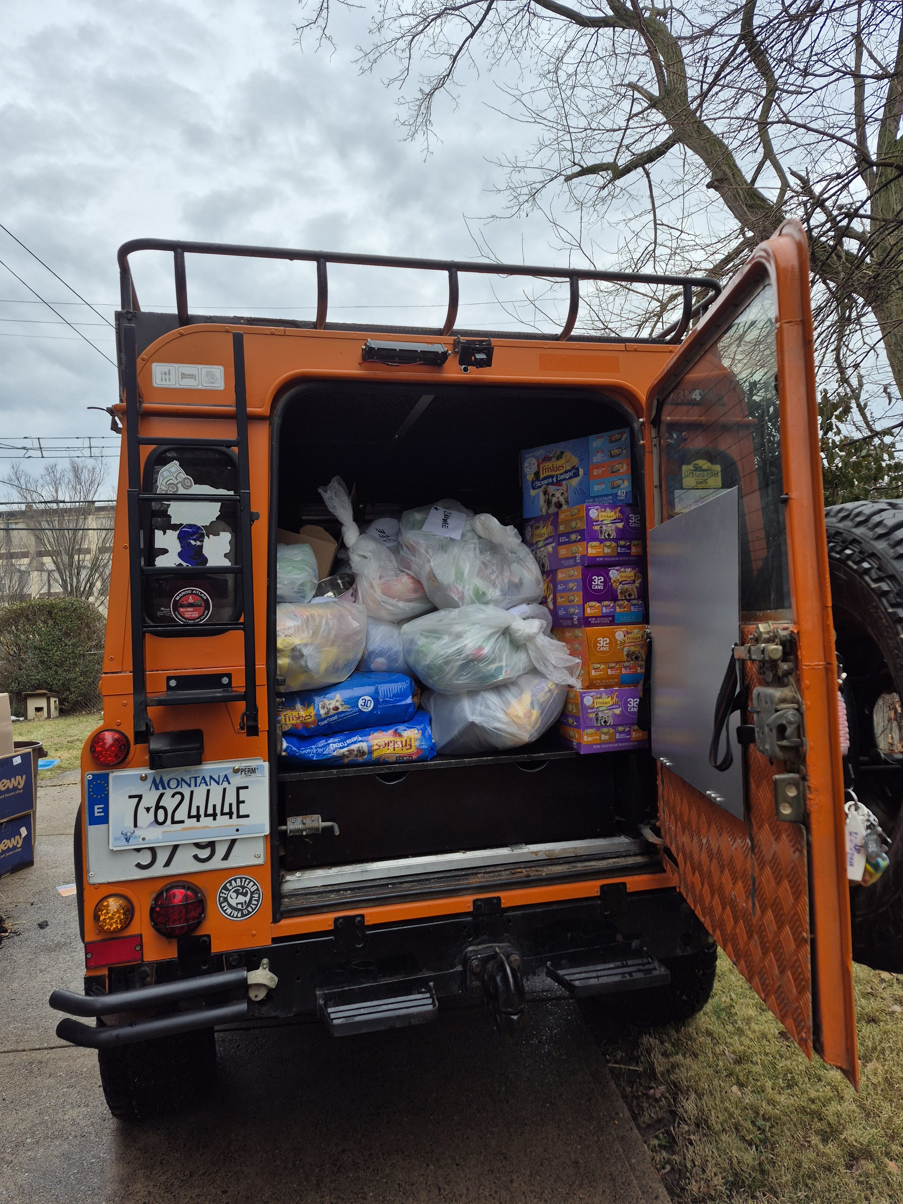 Gertie with donations and distributions packed inside